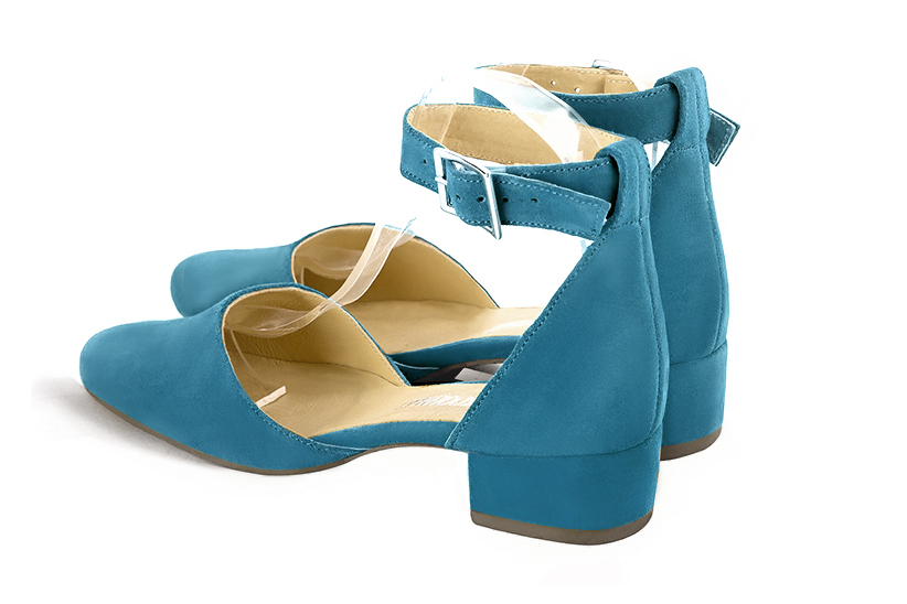 Peacock blue women's open side shoes, with a strap around the ankle. Round toe. Low block heels. Rear view - Florence KOOIJMAN